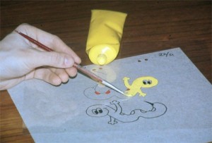 photo of animation cel being hand painted