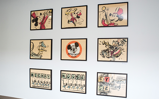 photo of nine framed Mickey Mouse Club illustrations from 1955