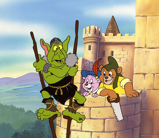 still showing Gummi Bears confronting ogre on stilts at the top of a castle tower