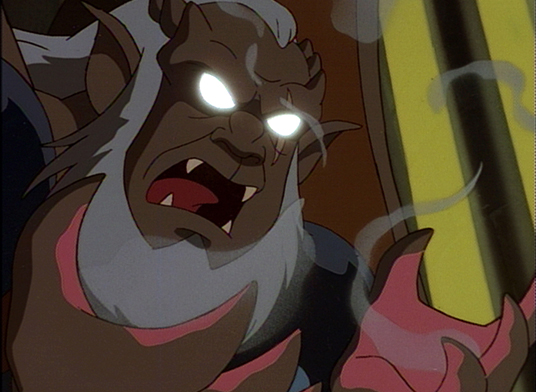 still from animated Gargoyles showing evil looking creature with glowing eyes