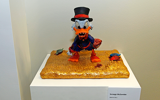 photo of small sculpture of Scrooge McDuck as a zombie