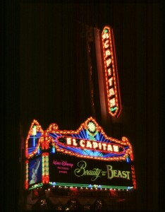 nighttime photo of El Capitan movie theater in Hollywood