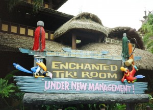 photo of sign outside the enchanted tiki room stating under new management