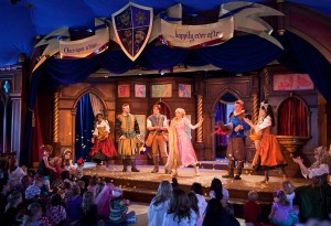 photo of stage production with ensemble medieval characters at Fantasy Faire at Disneyland