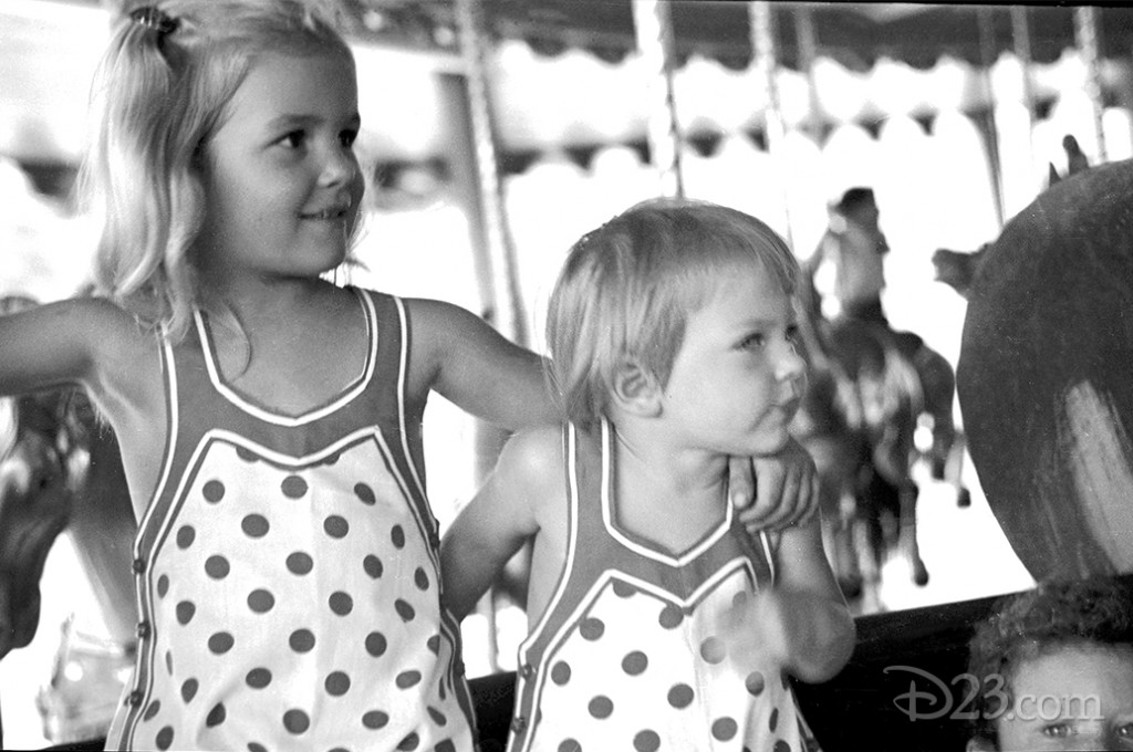 Sharon and Diane Disney on the Griffith Park carousel in Los Angeles, California