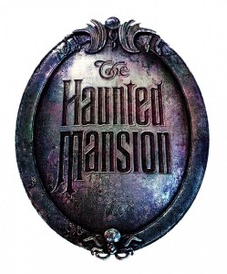 photo of oval metal sign for Haunted Mansion