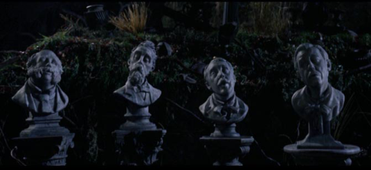 photo of four singing busts designed by Rick Baker originally for the Haunted Mansion film