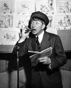photo of Holloway, Sterling at microphone reading a part