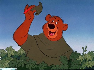 cel from animated Robin Hood showing Little John the bear tipping his hat