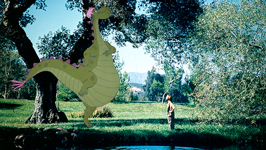 scene from Pete's Dragon featuring twenty-foot tall green cartoon dragon towering above little boy beside a pond