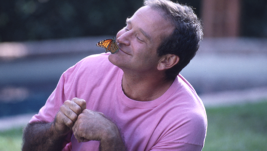 Photo of Robin Williams and a Butterfly