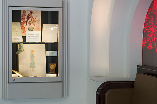 As a tribute to the film, the Walt Disney Archives put together a small display of props and costume concept art from the film in the theater’s lobby.