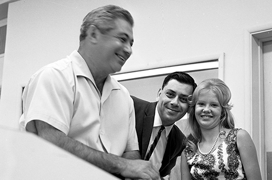 From left: Tutti Camarata, Robert Sherman, and Hayley Mills at a recording studio.