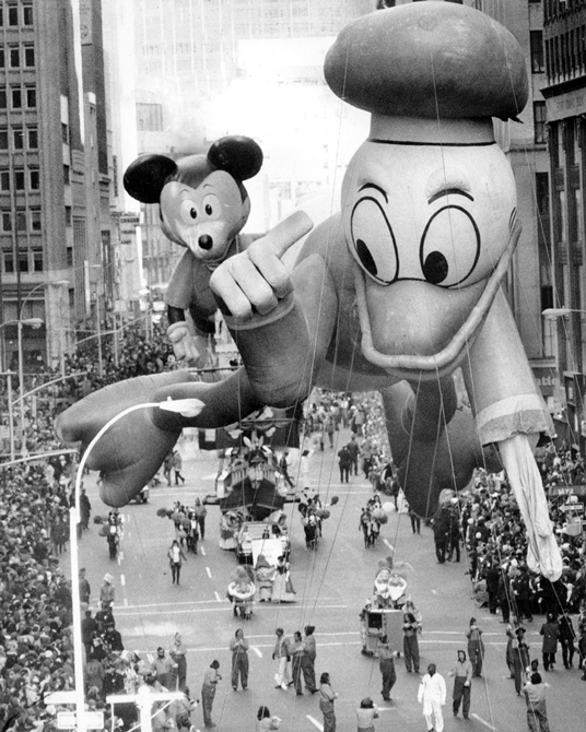 Mickey Mouse and Donald Duck celebrate the first anniversary of Walt Disney World at the parade in 1972