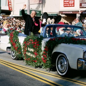 Photo of Walt Disney and Mickey Mouse riding in the Tournament of Roses Parade, Jan. 1966.