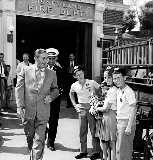 Walt Disney with some well-dressed Mouseketeers