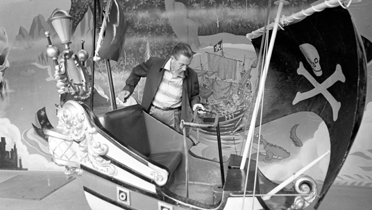 Walt Disney at the Peter Pan's Flight attraction at Disneyland.