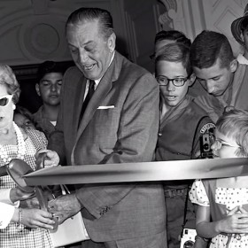 photo of Walt and Lillian Disney cutting dedication ribbon at Disneyland