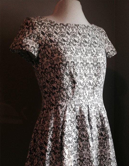 photo of dress created by Holly Frey with black and white patterns based on Haunted Mansion designs