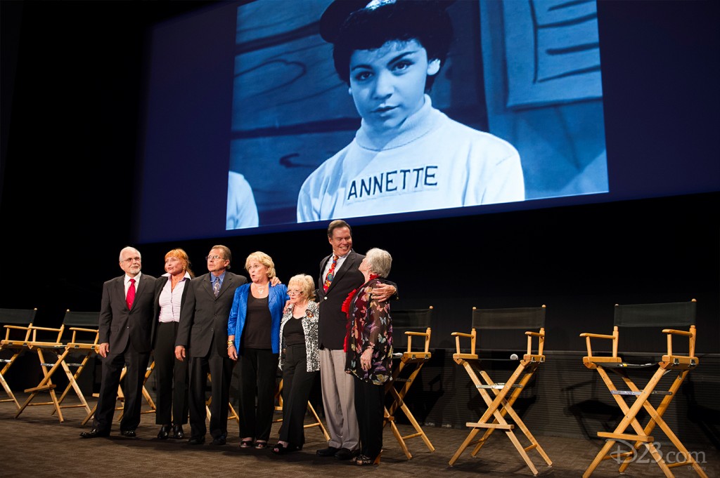In a fitting tribute to their fellow Mouseketeer, (L-R) Tommy Cole, Doreen Tracey, Cubby O’Brien, Sherry Alberoni, Sharon Baird, Bobby Burgess, and Darlene Gillespie sing the Mickey Mouse Club “Alma Mater.”