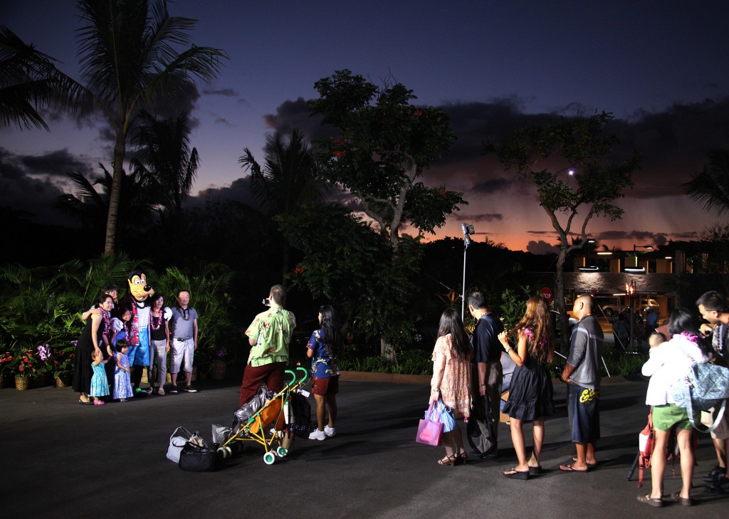 Scores of first-day guests waited outside the entrance of Aulani, a Disney Resort & Spa, Ko Olina, Hawaii, before the resort opened for its first day, Monday, August 29. Goofy greeted the waiting guests and posed for photos.