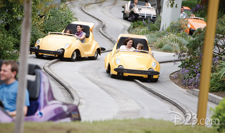 Guests driving Autopia cars