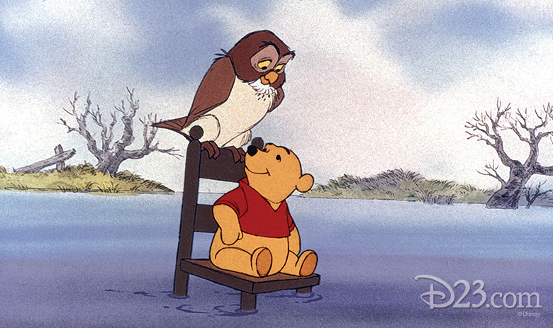Winnie the Pooh and Owl on a chair