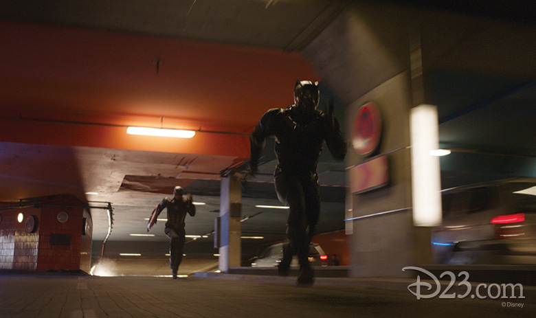 Captain America chasing Black Panther