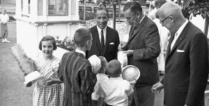 Walt Disney signing autographs at Disneyland