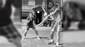 Kurt Russell playing baseball
