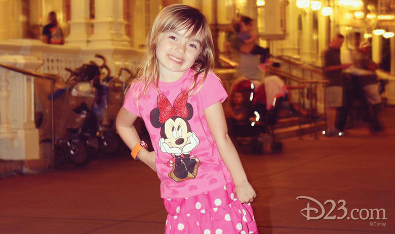 Little girl waiting for the Main Street Electrical Parade