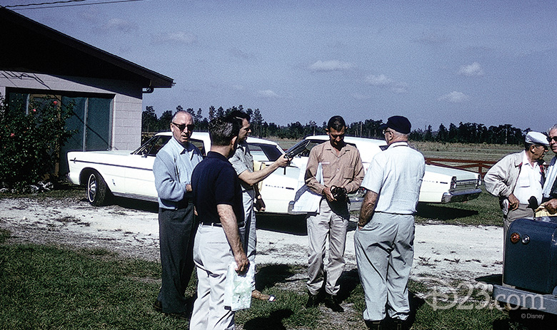 Roy Disney, Joe Potter, Bob Foster, Bill Hart, Joe Fowler, and Walt gather at the Smiths’ house in 1965. (Man to the right of Walt is unidentified).