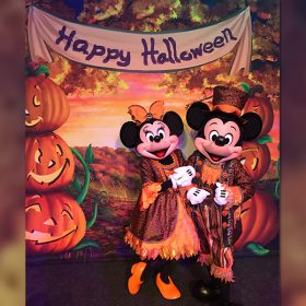 Mickey and Minnie in Halloween outfits
