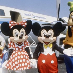 Mickey, Minnie, Donald, and Goofy with Walt Disney's plane