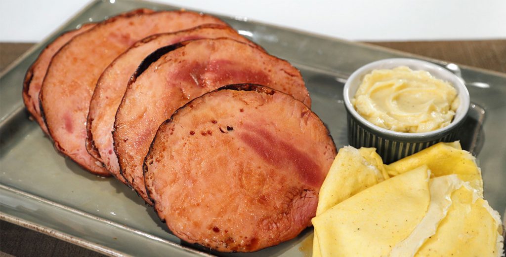 Molasses Glazed Ham with Cornmeal Crepes and Honey Butter