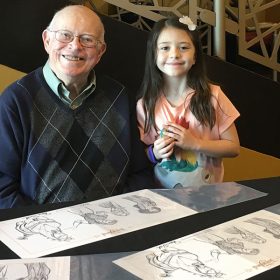 Dave Smith with a young guest at Tangled in Florida event recap