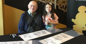 Dave Smith with a young guest at Tangled in Florida event recap