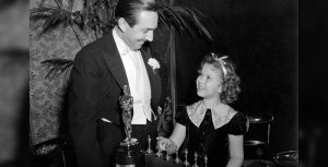 Walt receiving an Academy Award for Snow White and the Seven Dwarfs