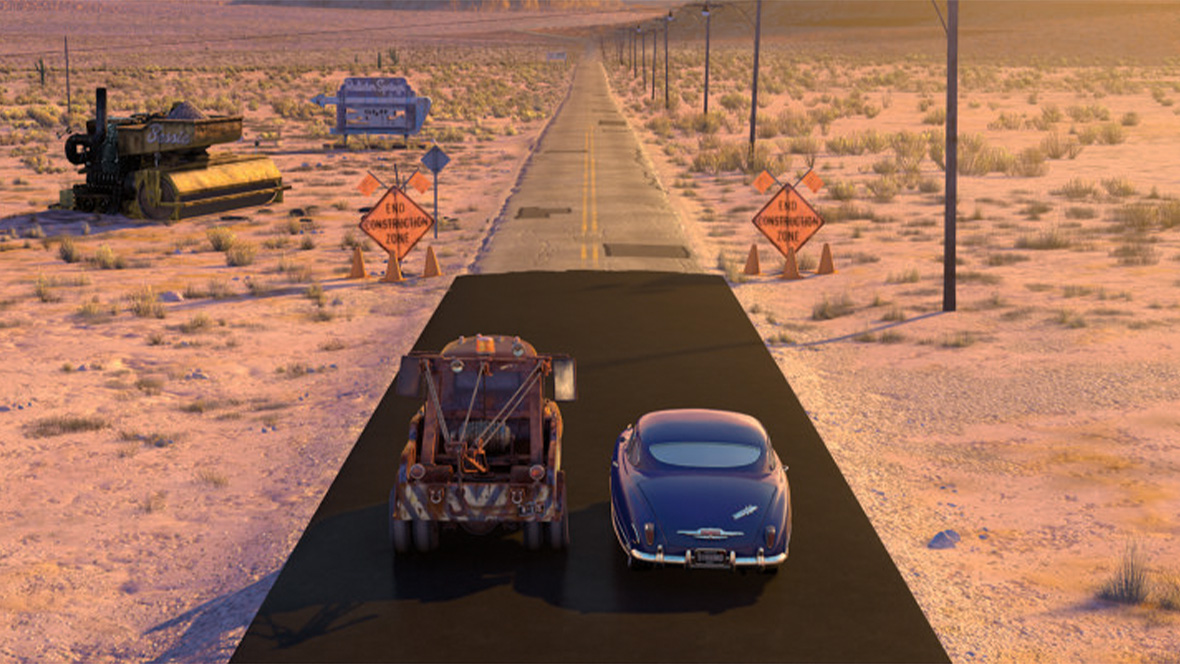 A still of Tow Mater and Doc Hudson.