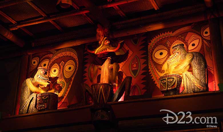 carved drummer statues inside the Enchanted Tiki Room