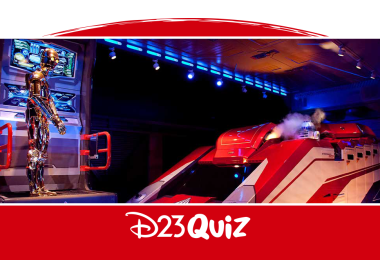 An image of C3PEO and a vehicle in the Disneyland attraction, Star Tours.