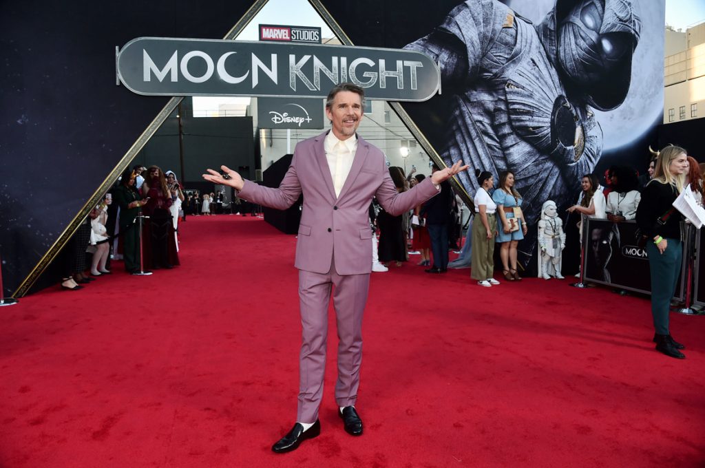 LOS ANGELES, CALIFORNIA - MARCH 22: (L-R) Ethan Hawke and guest attend the Moon Knight Los Angeles Special Launch Event at the El Capitan Theatre in Hollywood, California on March 22, 2022. (Photo by Alberto E. Rodriguez/Getty Images for Disney)