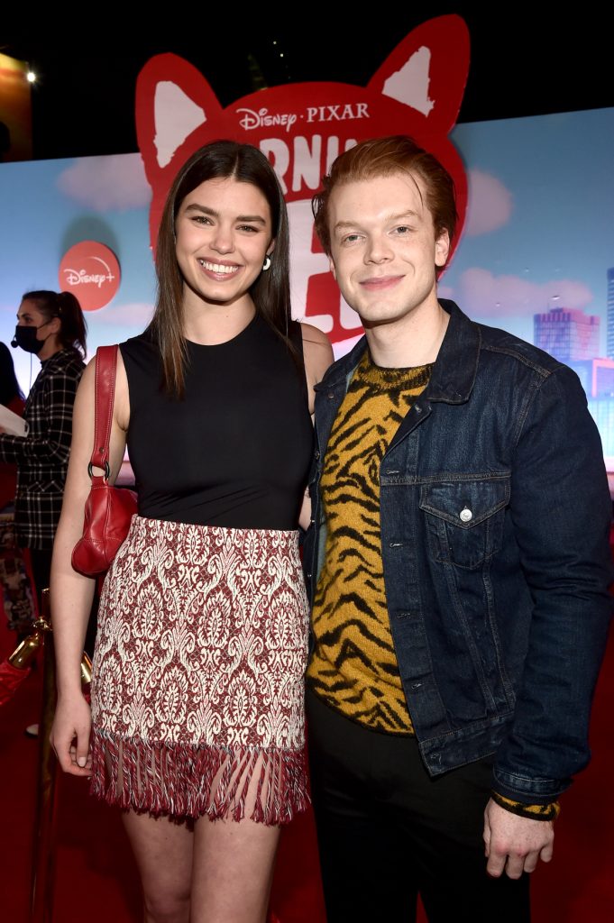 LOS ANGELES, CALIFORNIA - MARCH 01: (L-R) Lauren Searle and Cameron Monaghan attend the world premiere of Disney and Pixar's Turning Red at El Capitan Theatre in Hollywood, California on March 01, 2022 to celebrate the launch on Disney+ on March 11th. (Photo by Alberto E. Rodriguez/Getty Images for Disney)