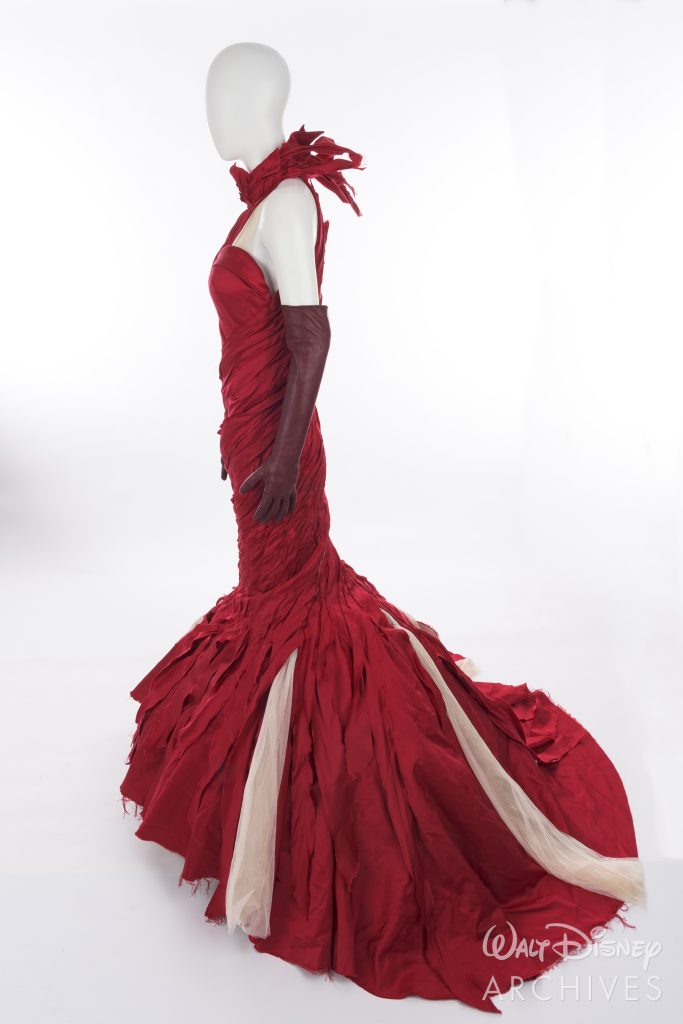 Cruella
2021
Red satin Gown
HERO

Change consists of: Gown, Waist Cincher, Gloves, Shoes