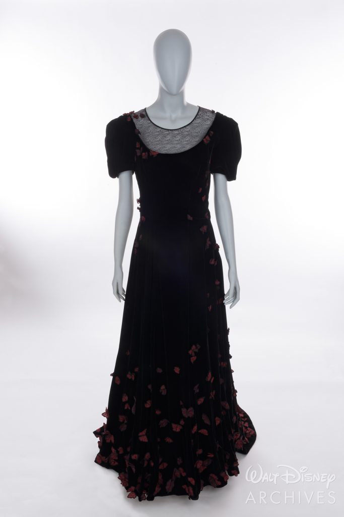 Nightmare Alley
2021
Molly Cahill 
Black Velvet Gown with red butterflies
HERO
Black velvet evening gown with webbed black organza chest and back insert, red and black butterfly appliqués, side zip/hook-eyes