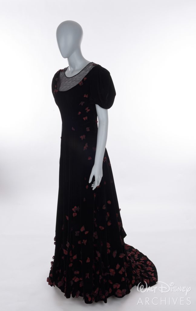 Nightmare Alley
2021
Molly Cahill 
Black Velvet Gown with red butterflies
HERO
Black velvet evening gown with webbed black organza chest and back insert, red and black butterfly appliqués, side zip/hook-eyes