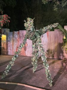 A sculpture at Disney's Animal Kingdom that's covered head to toe in vines and flora and measures measures between 7 and 16 ft. tall!