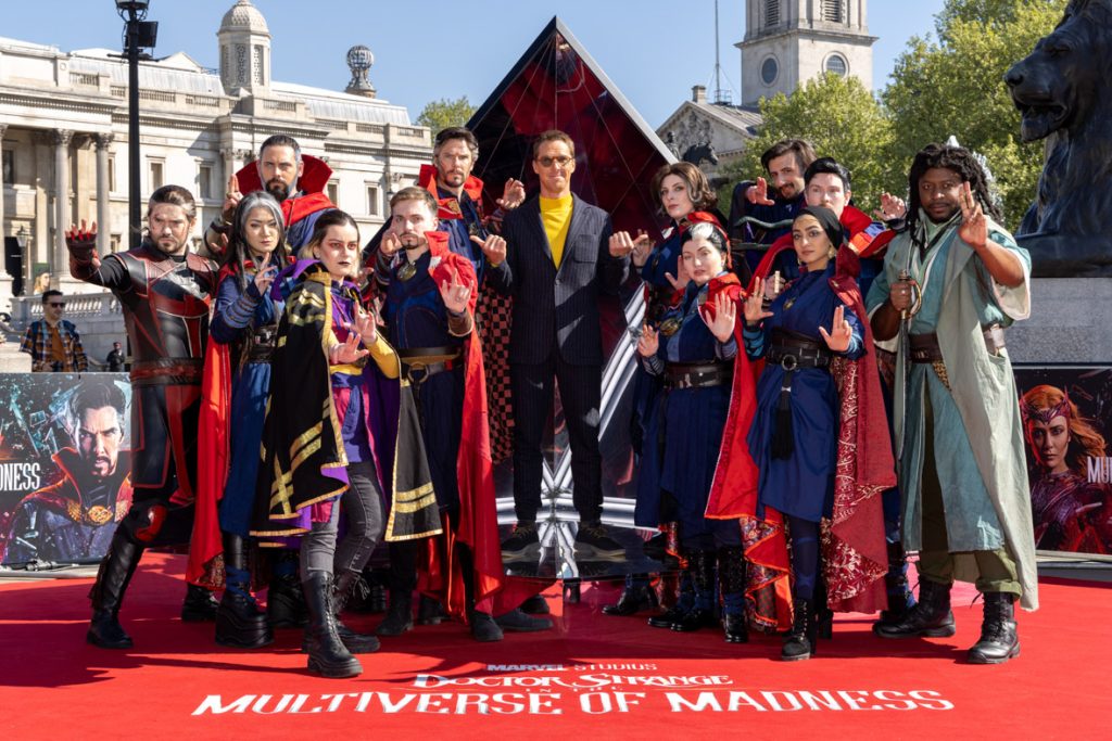 LONDON, ENGLAND - APRIL 26:  Benedict Cumberbatch (C) with cosplayers attend the photocall for Marvel Studios' "Doctor Strange in the Multiverse of Madness" in Trafalgar Square on April 26, 2022 in London, England. (Photo by James Gillham/StillMoving.net for Disney)