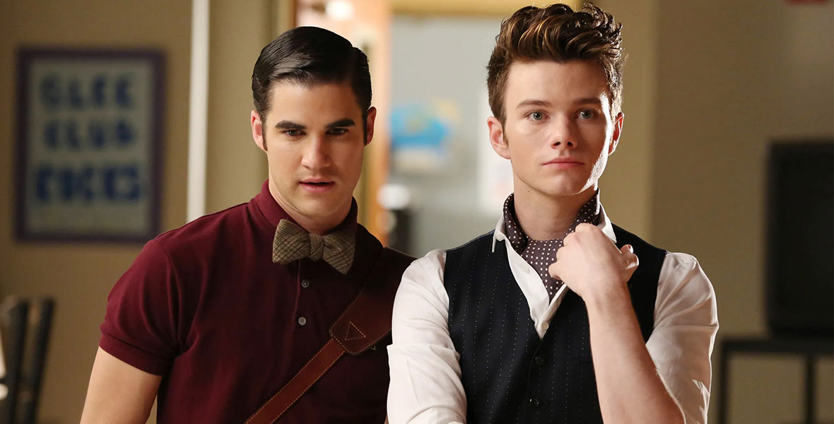 Darren Criss and Chris Colfer star as Blaine Anderson and Kurt Hummel, respectively, in Glee.