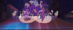 Emily Blunt (Mary Poppins) and Lin Manuel Miranda (Jack) dance with a cast of animated characters in matching purple ensembles during the musical number “A Cover Is Not the Book.”